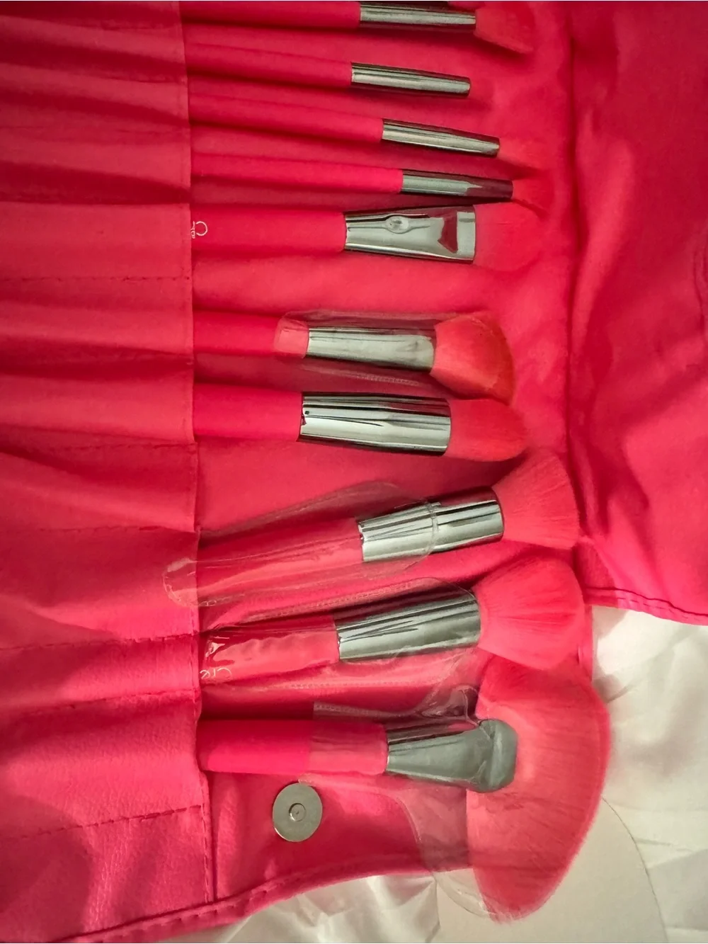 Hot pink Beauty creations makeup brushes